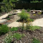 Native Garden with Dry Creek Bed and Recycled Railway Sleeper Bridges